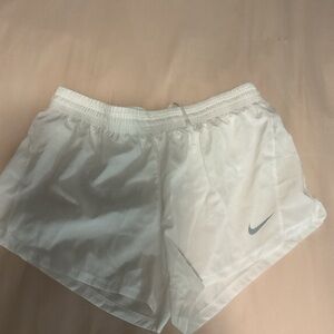 White Nike shorts